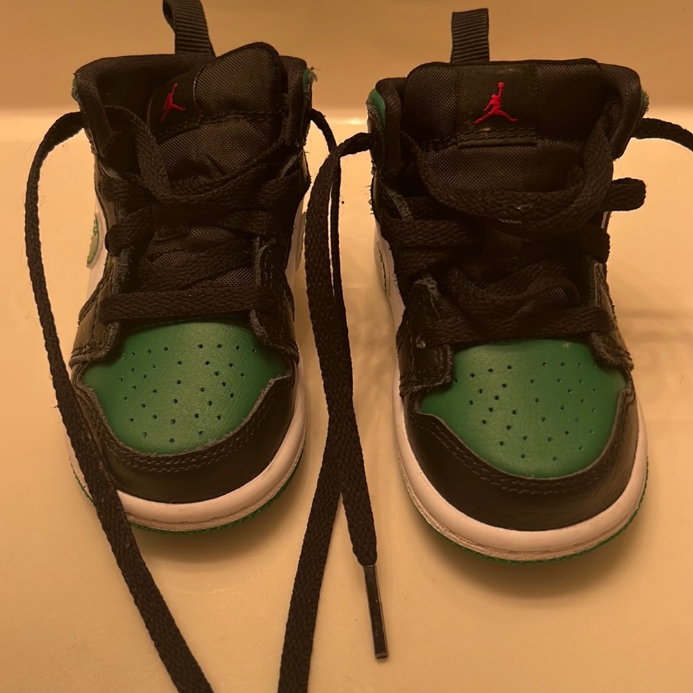 5C Green, Black, and White Jordans